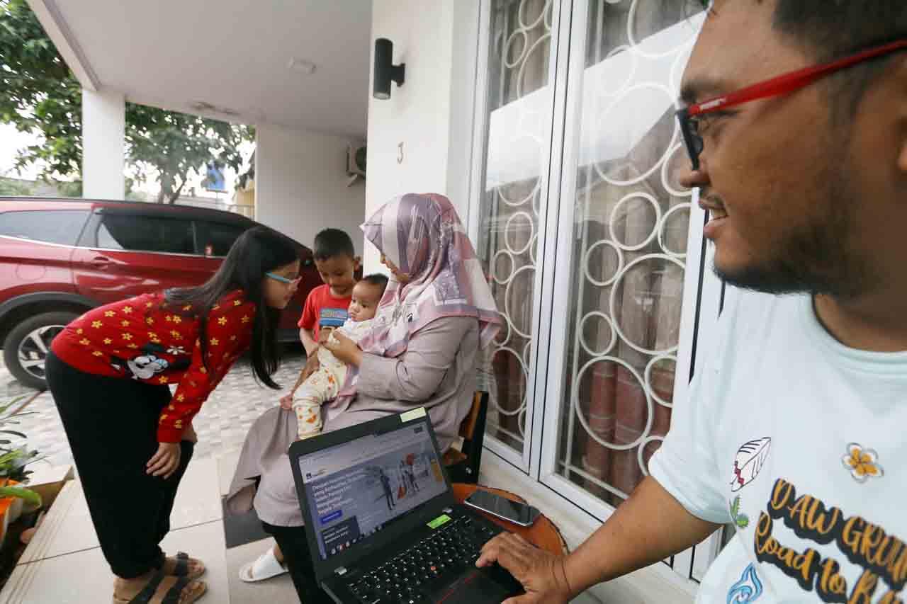 Komitmen AXA Mandiri...