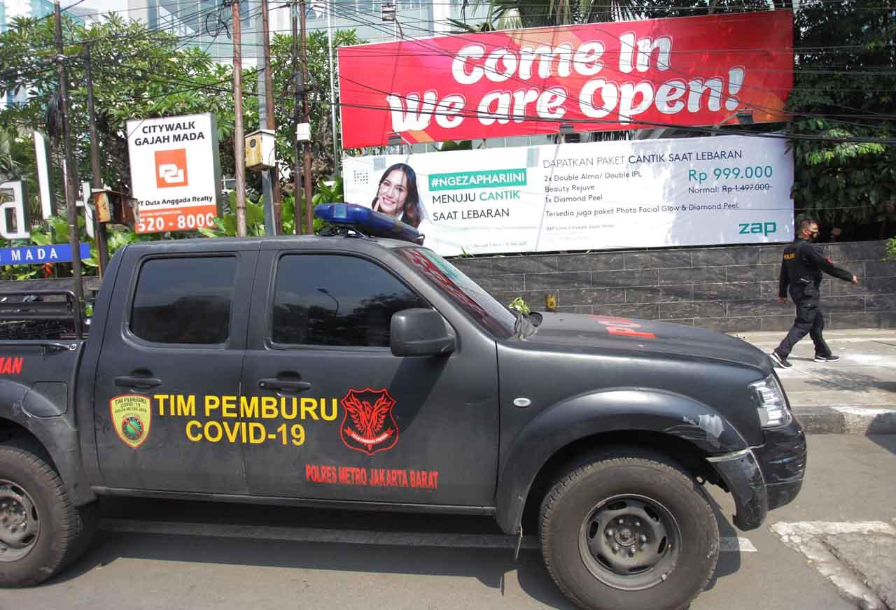 Polisi dan Tentara Jaga...