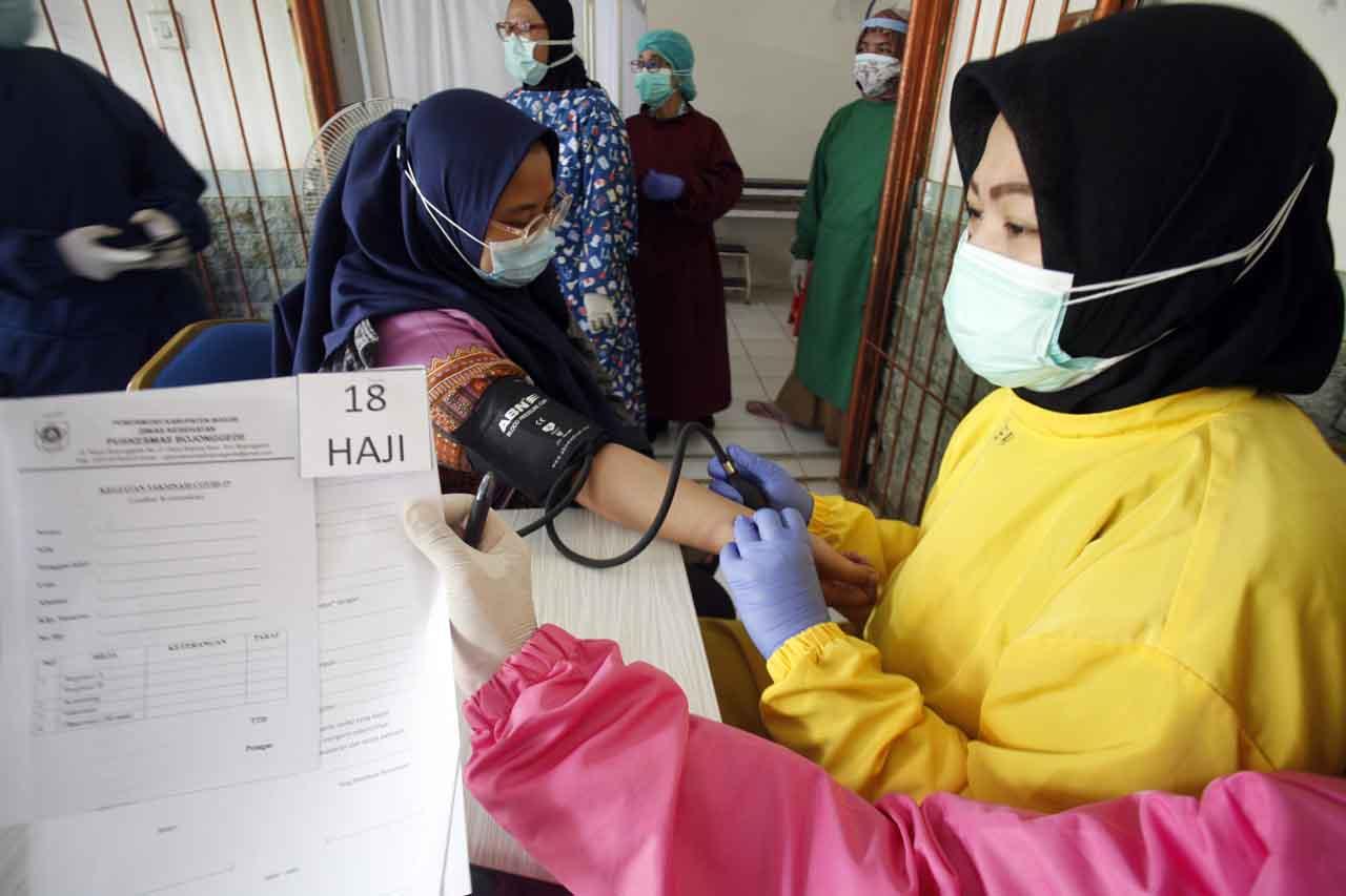 Vaksinasi Covid-19 untuk...