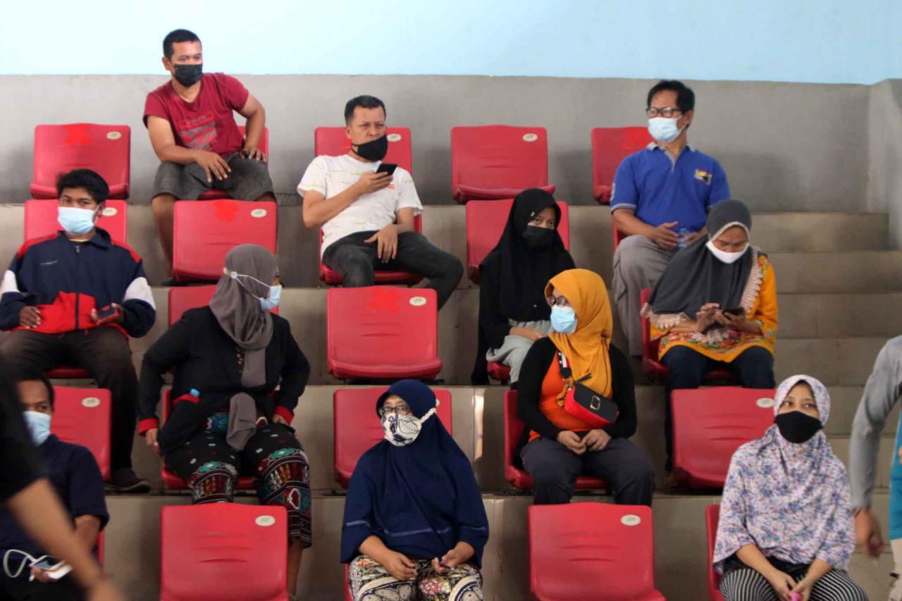 Vaksinasi Covid-19 untuk...