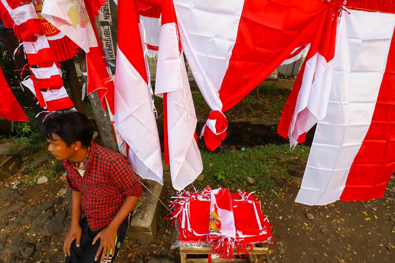 Pedagang Bendera Merah...
