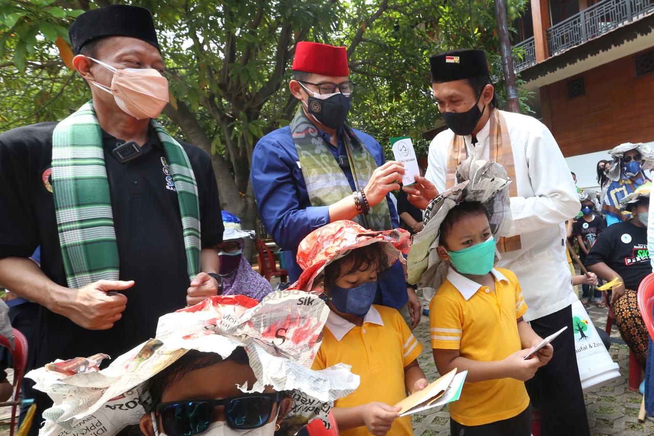 Pemanfaatan Sampah Menjadi...