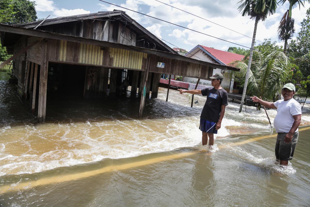 Dampak Banjir Luapan...