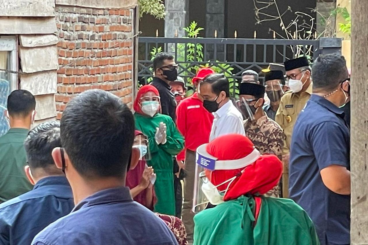 Presiden Jokowi dan...