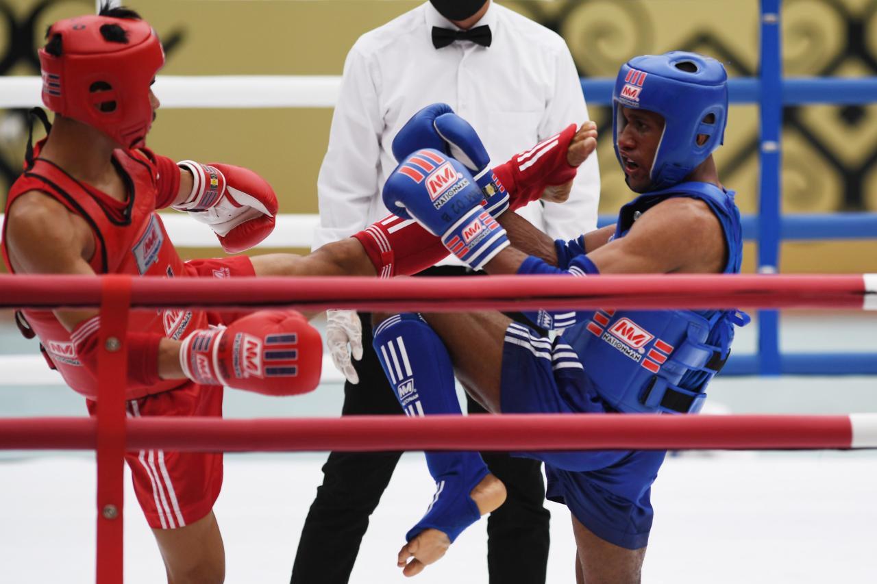Aksi Atlet Muay Thai...