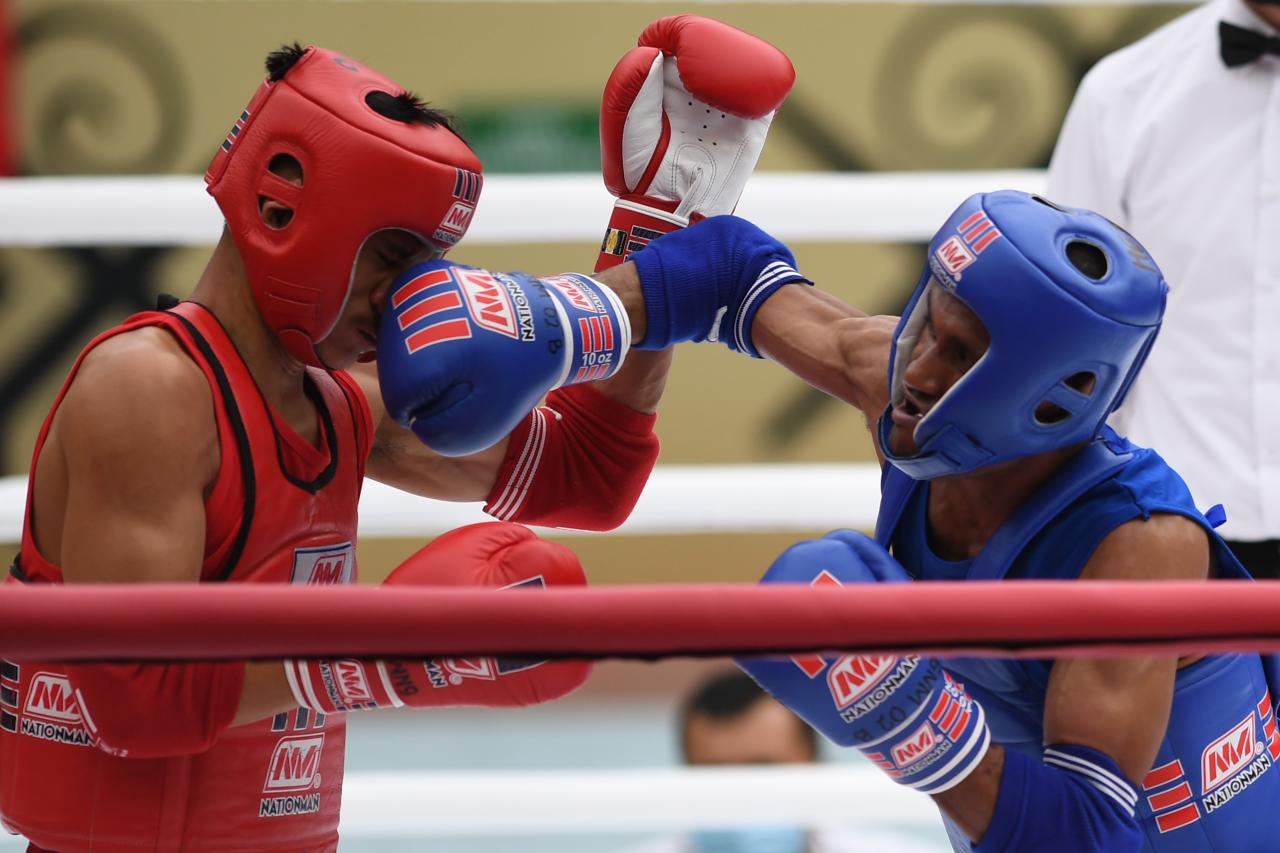Aksi Atlet Muay Thai...