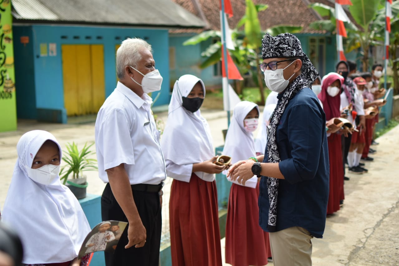 Melalui Program Desa...
