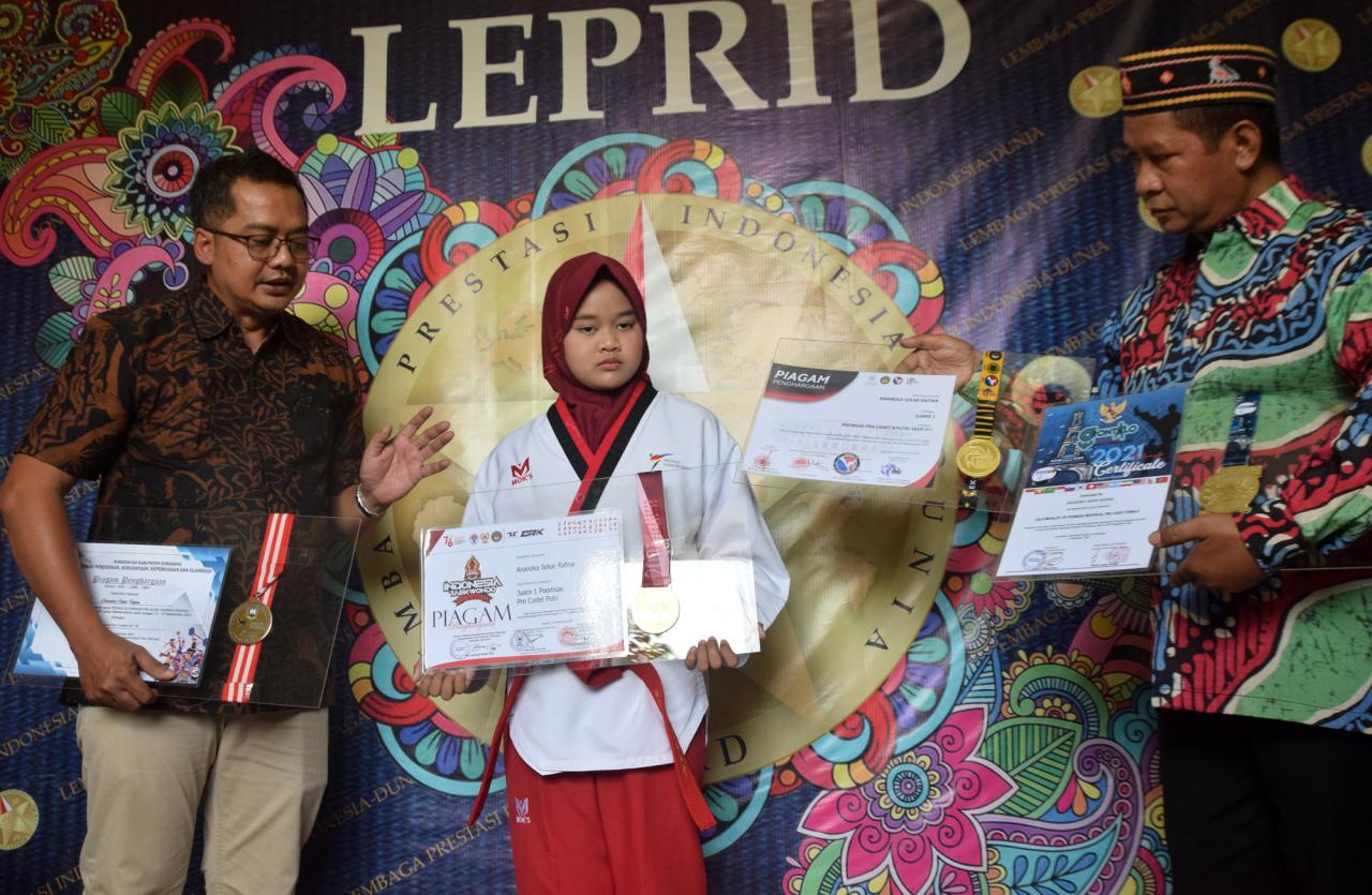 Aksi Atlet Taekwondo...