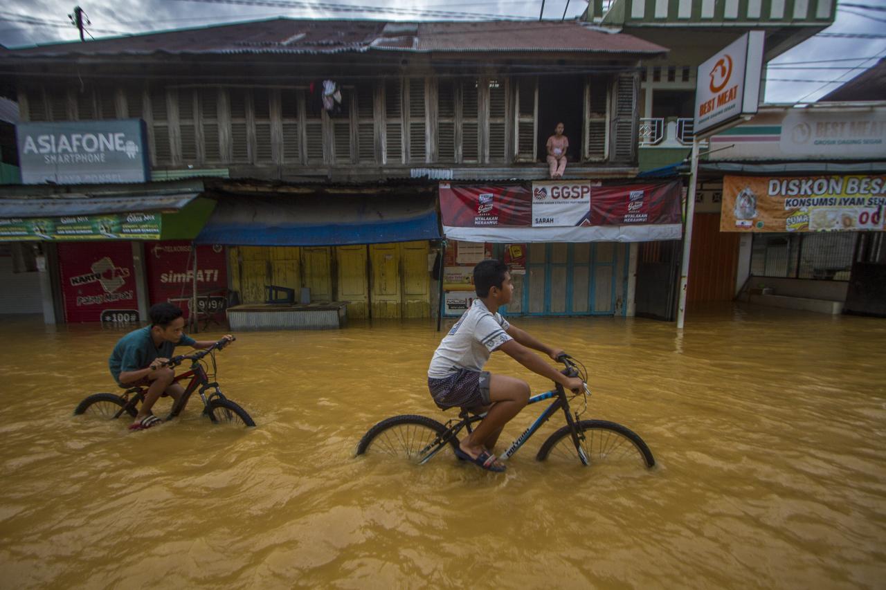 Banjir Kembali Rendam...