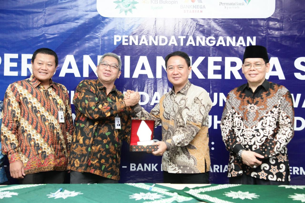 Kerja Sama Bukopin Syariah...
