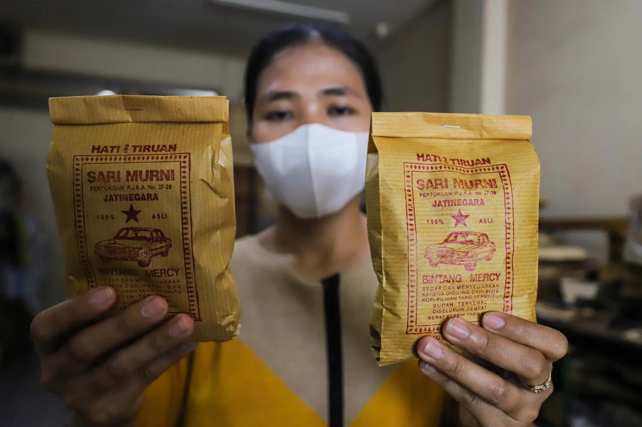 Geliat Toko Kopi Sari...