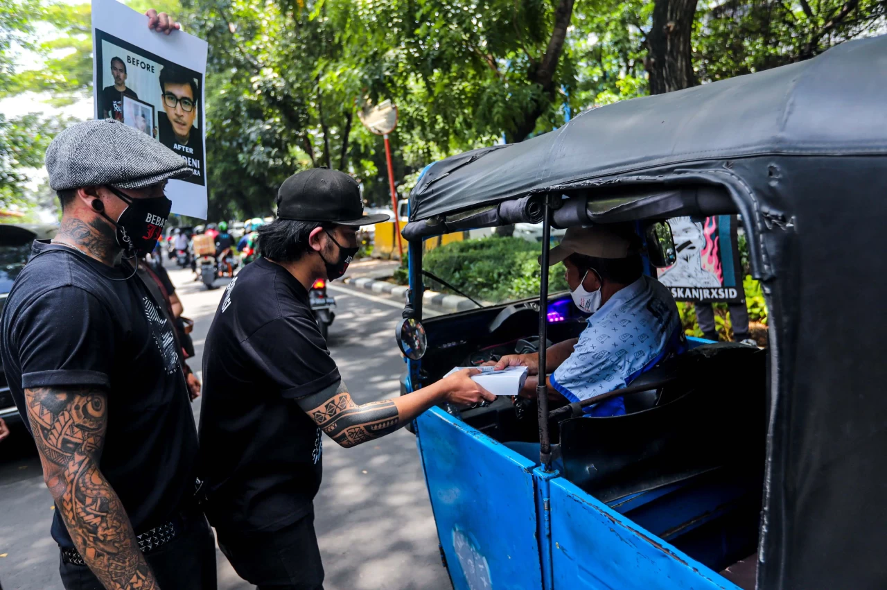 Aksi Solidaritas Outsider...