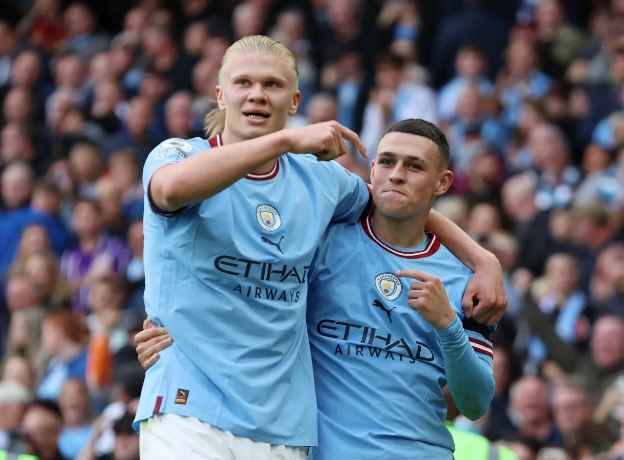 Erling Haaland dan Phil...