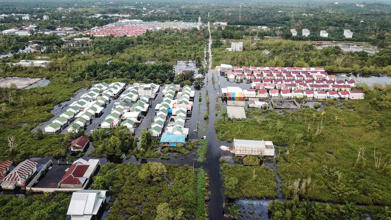 Dampak Banjir Luapan...