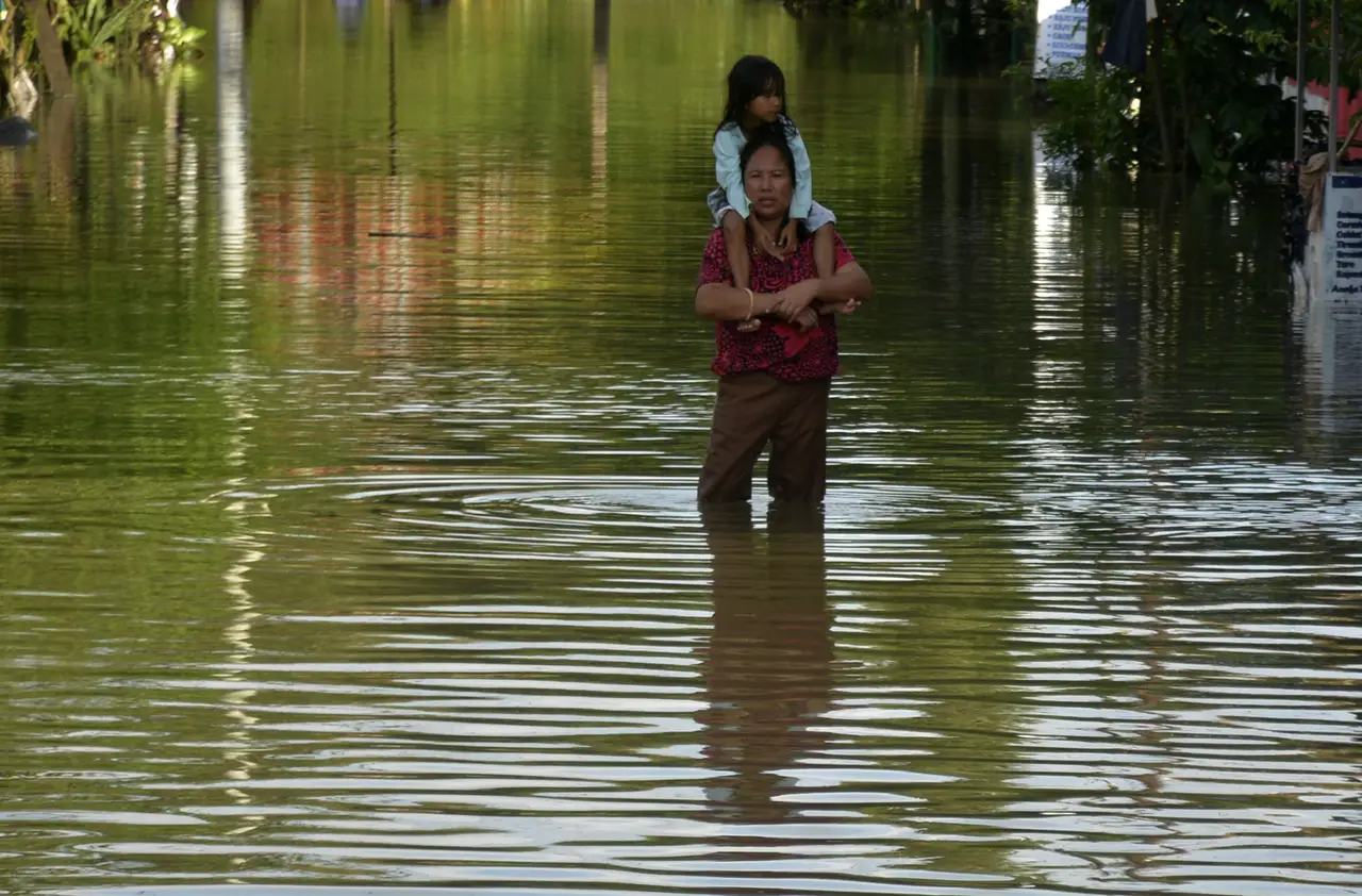 Banjir Merendam Kota...