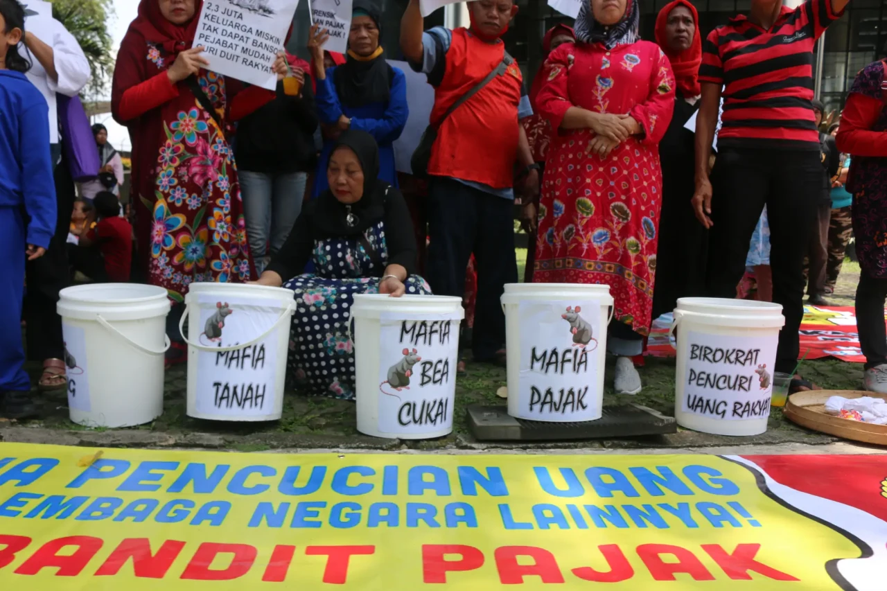 Aksi Menuntut KPK Tuntaskan...
