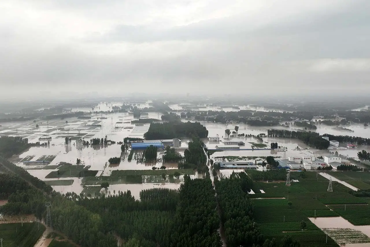Banjir China Meluas,...