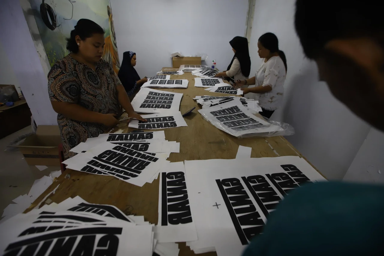 Melihat Produksi Kaos...