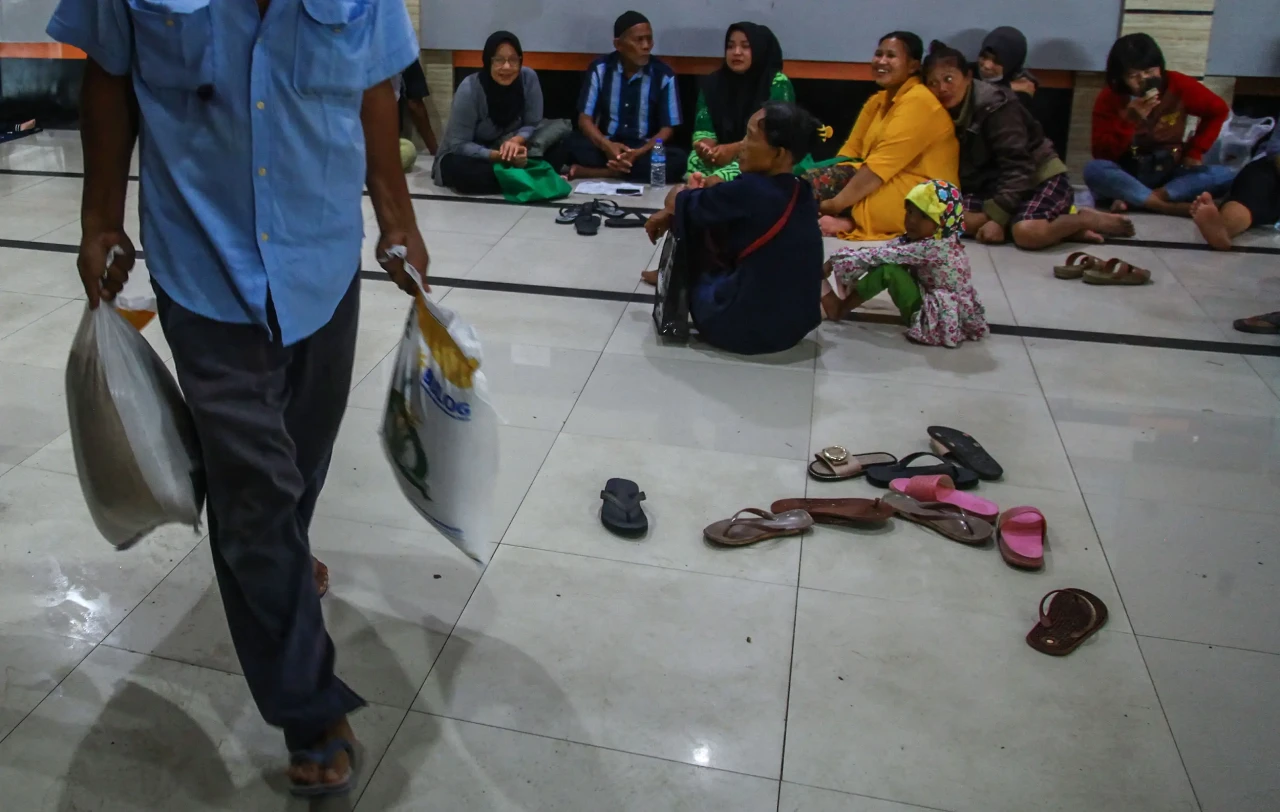 Potret Pembagian Bantuan...