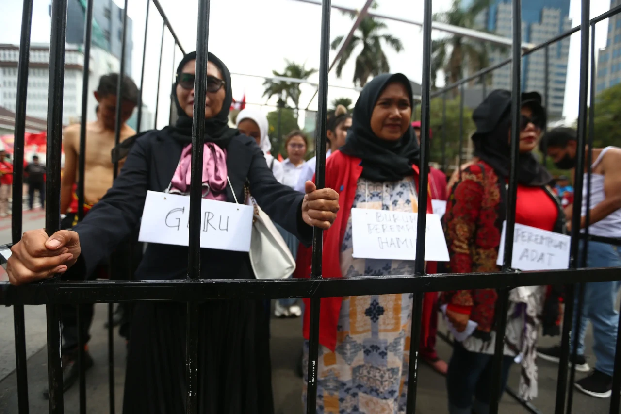Aksi Kurung Jeruji Peringatan...