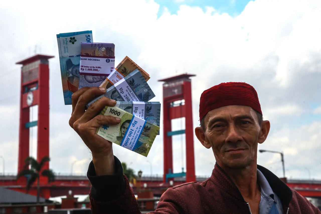 Potret Penukaran Uang...