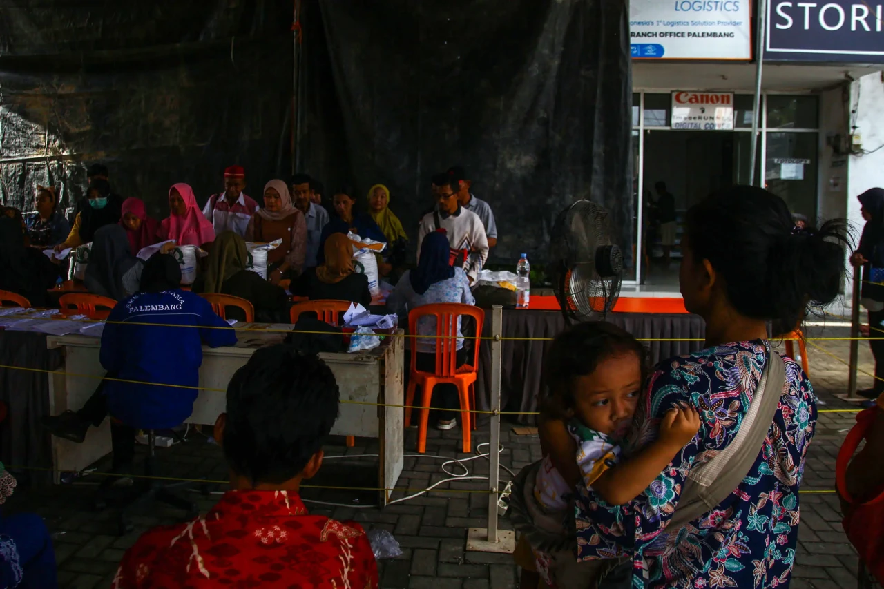 Potret Pembagian Bantuan...