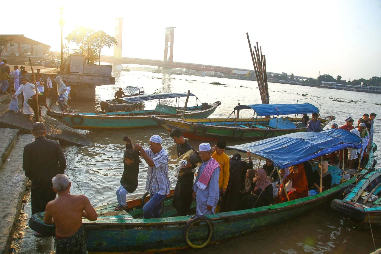 Potret Warga Palembang...