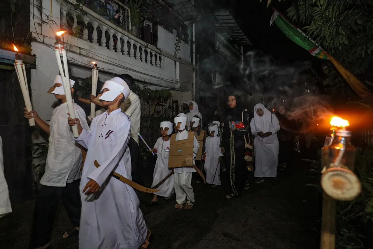 Pawai Obor Sambut Tahun...