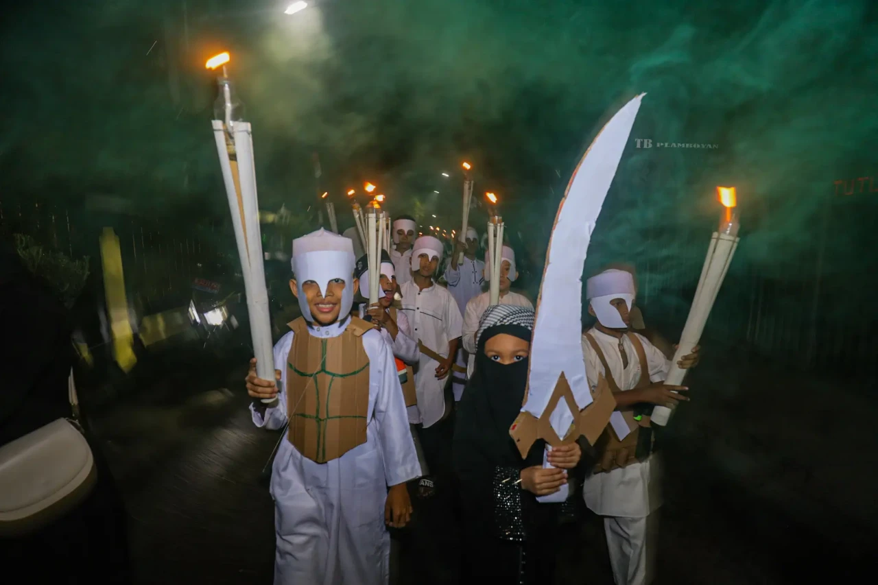 Pawai Obor Sambut Tahun...