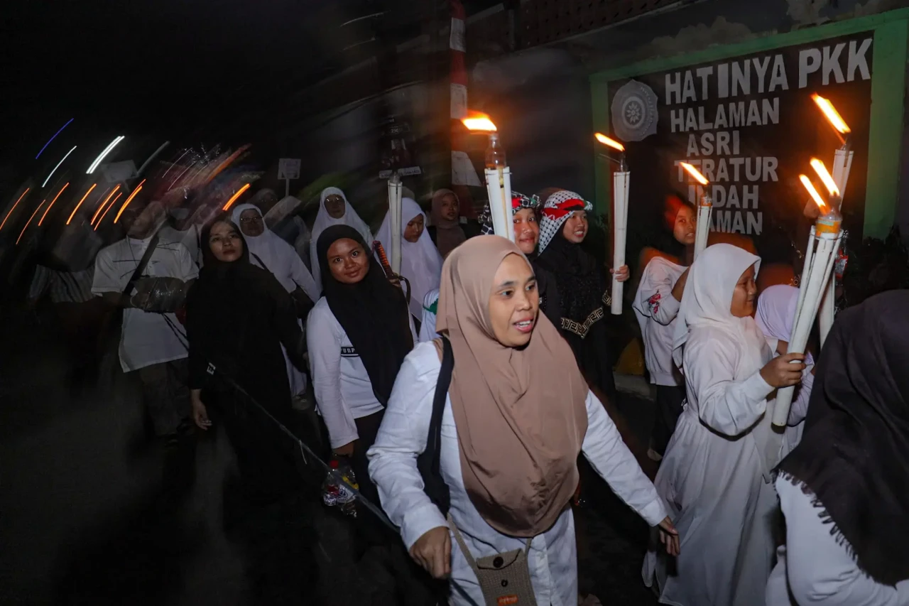 Pawai Obor Sambut Tahun...