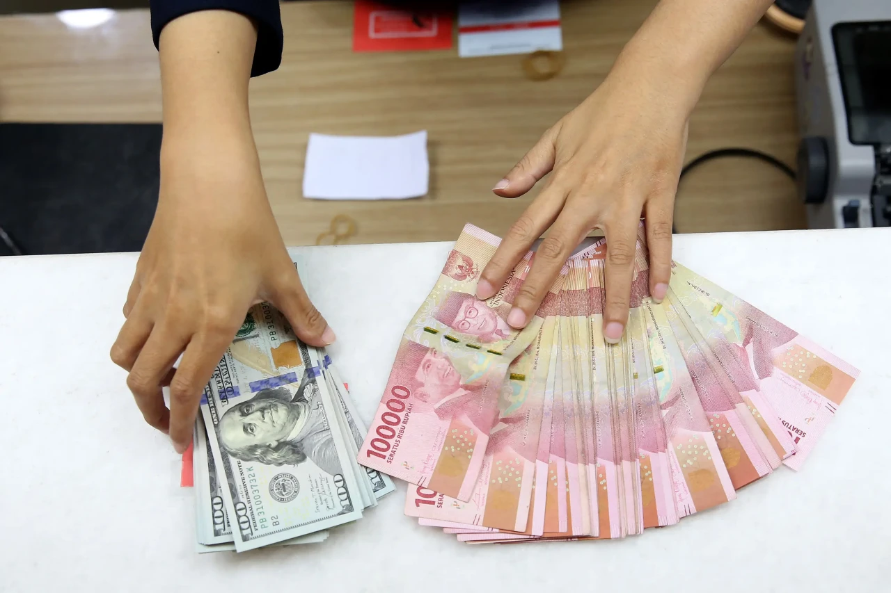 Rupiah Ditutup Melemah...