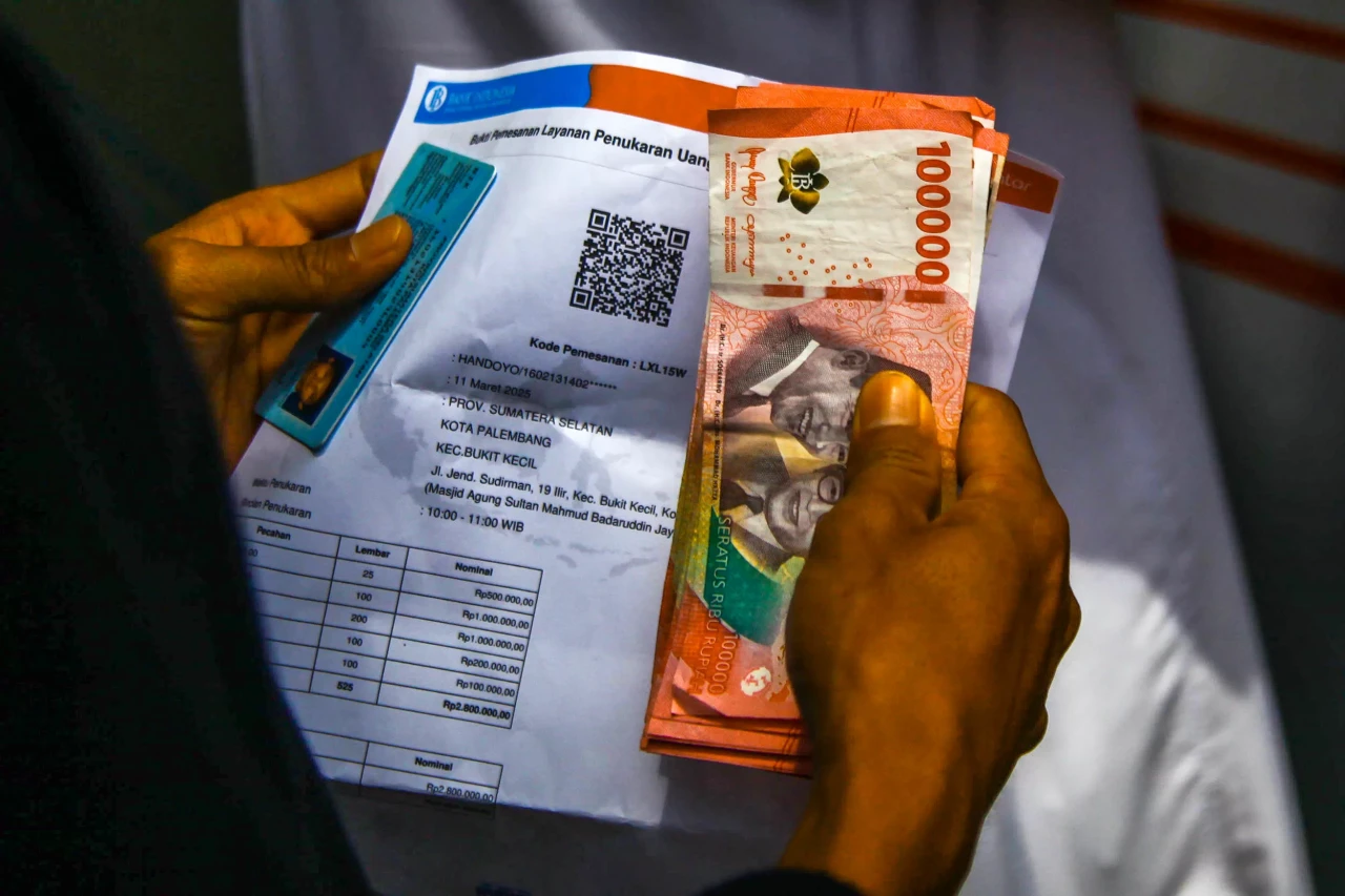 Potret Penukaran Uang...