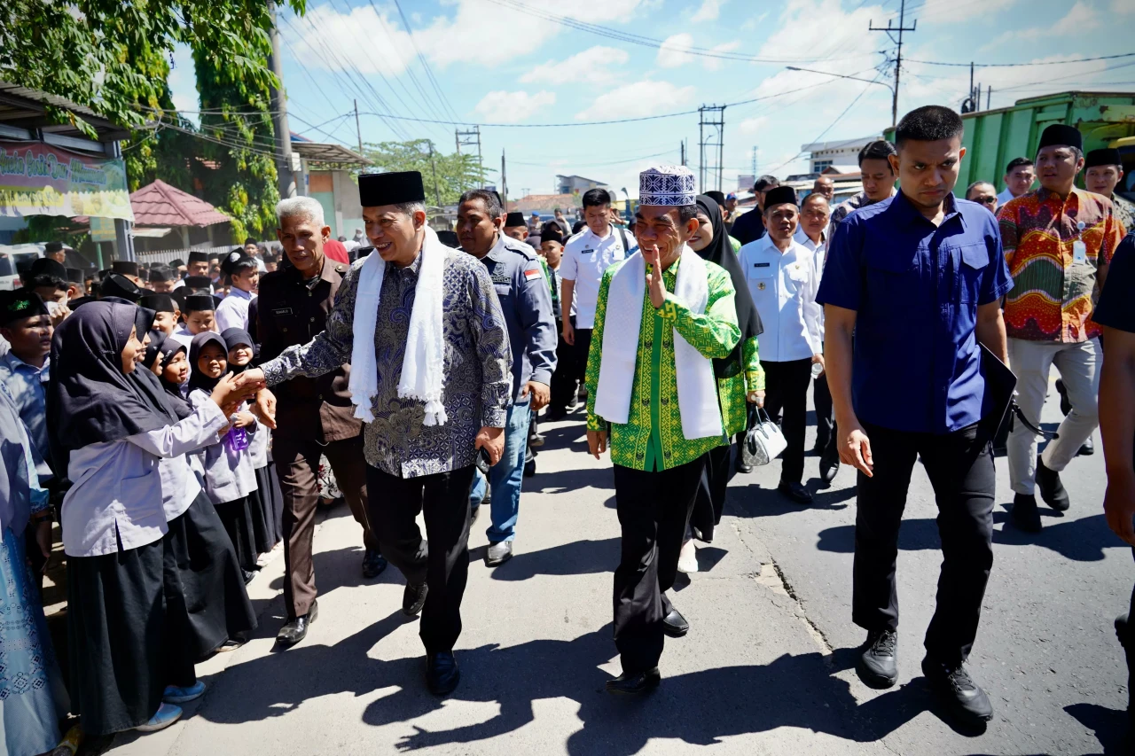 Perkuat Ekonomi Umat,...