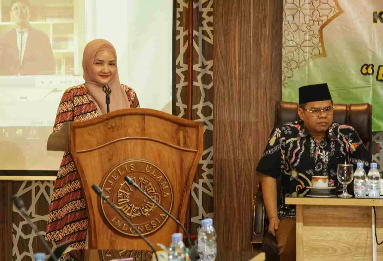 AXA Mandiri Salurkan...