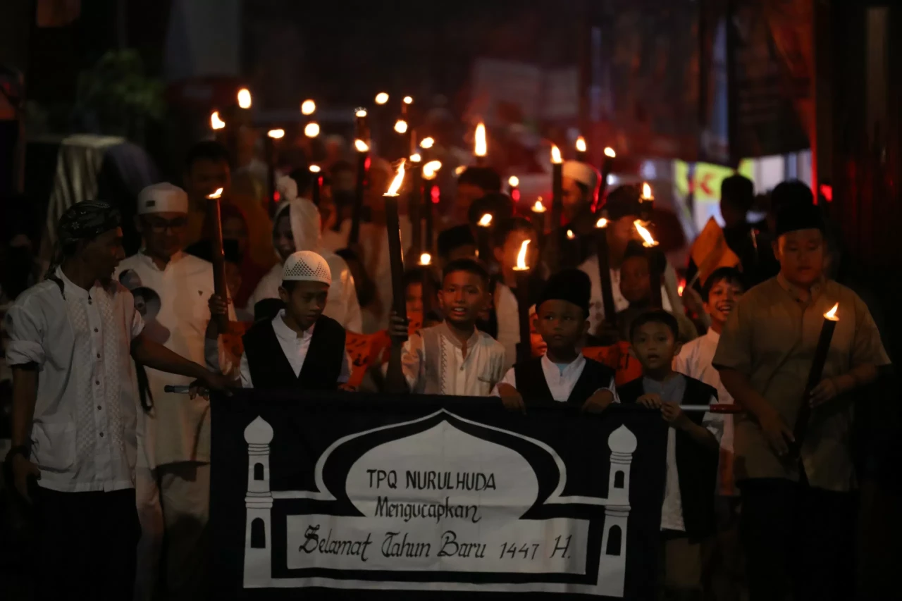 Pawai Obor Memperingati...