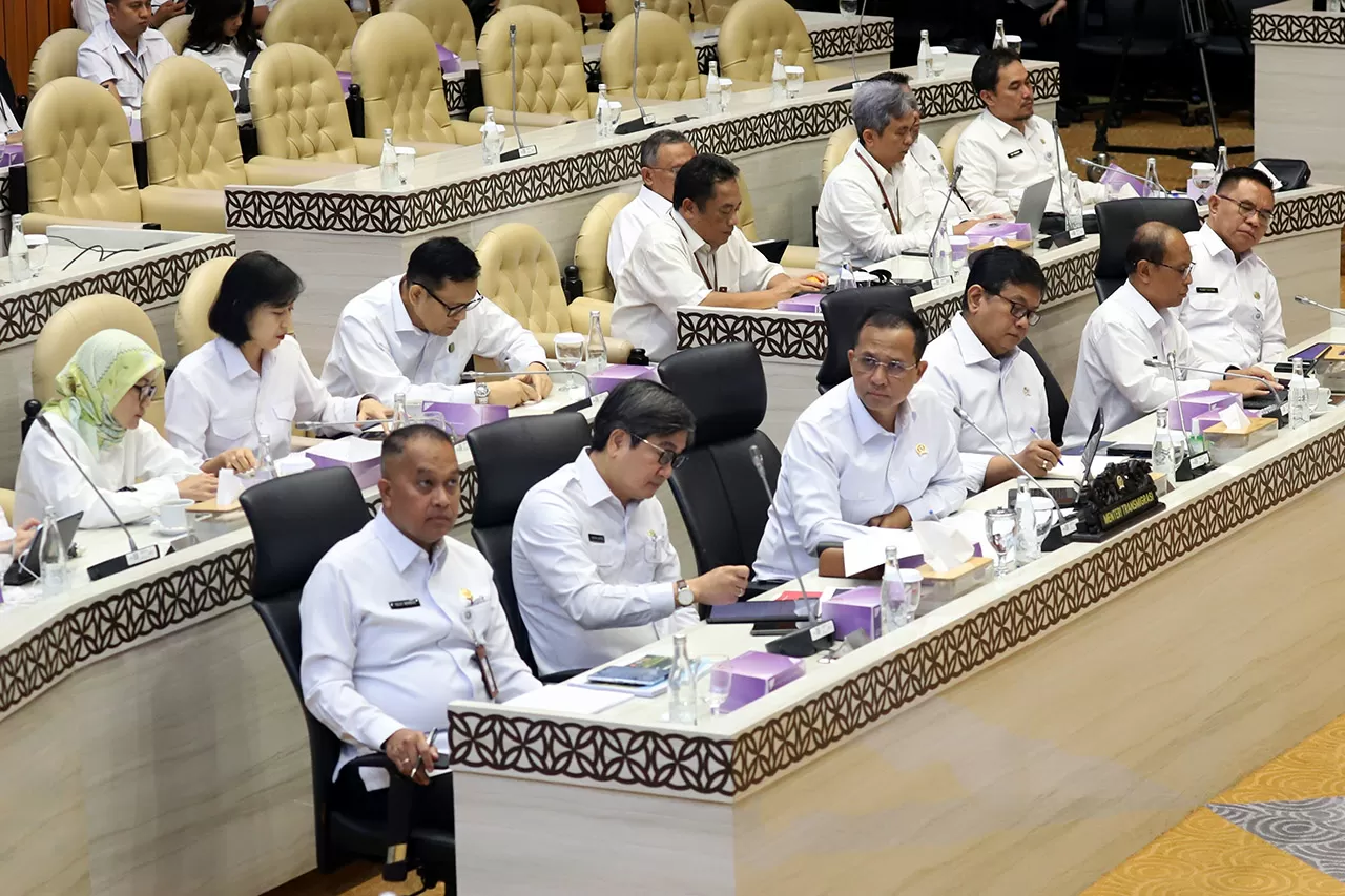 Menteri Transmigrasi...