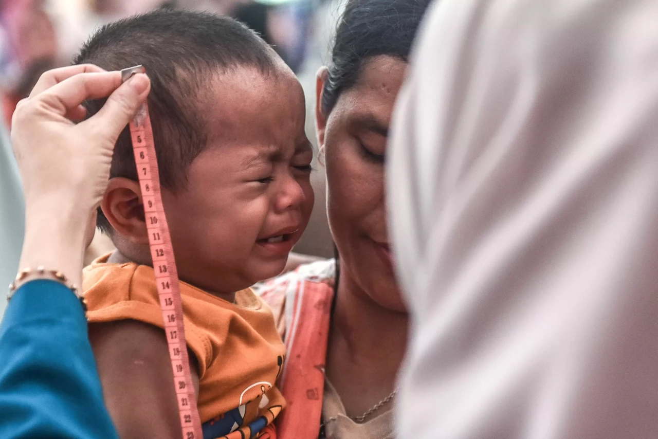 Potret Pemeriksaan Anak...
