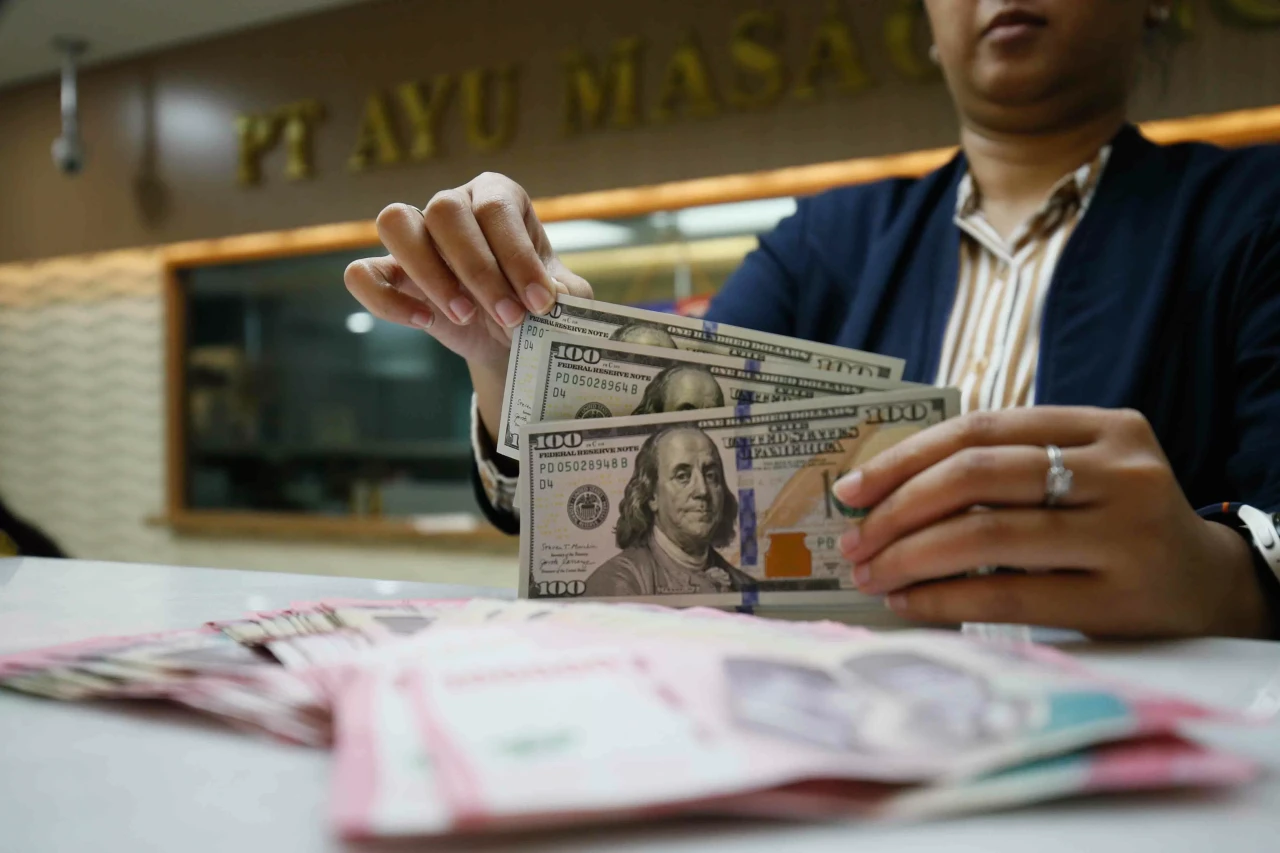 Rupiah Ditutup Melemah...