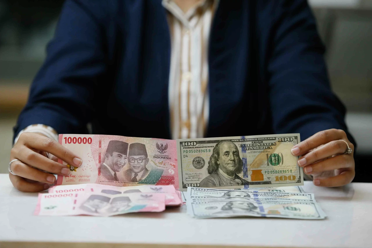 Rupiah Ditutup Melemah...