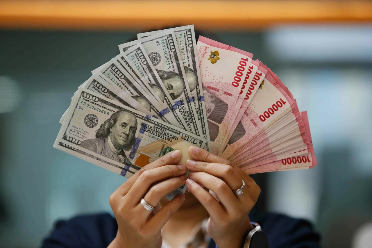 Rupiah Ditutup Melemah...