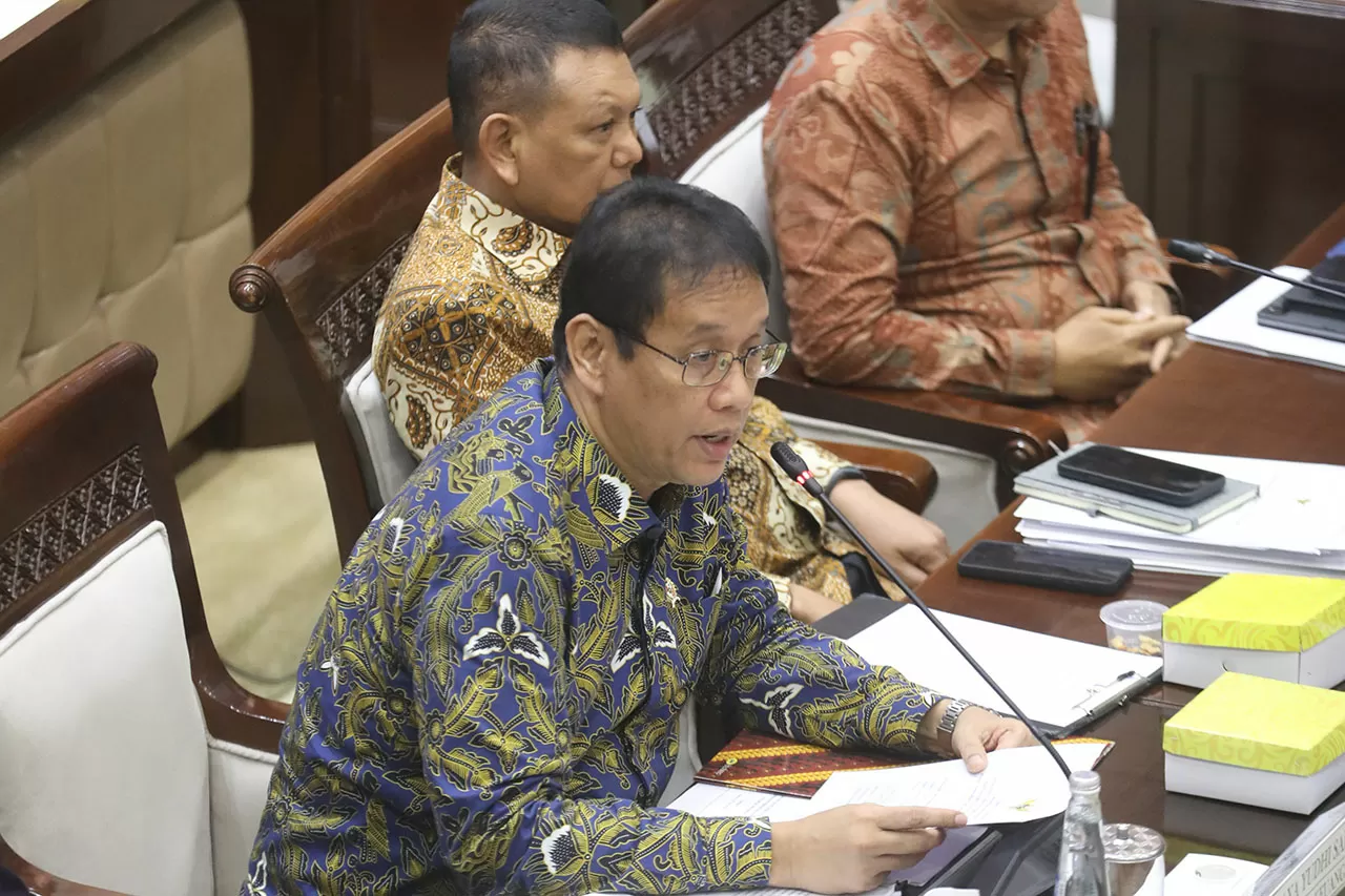 Komisi XI DPR dan Pemerintah...