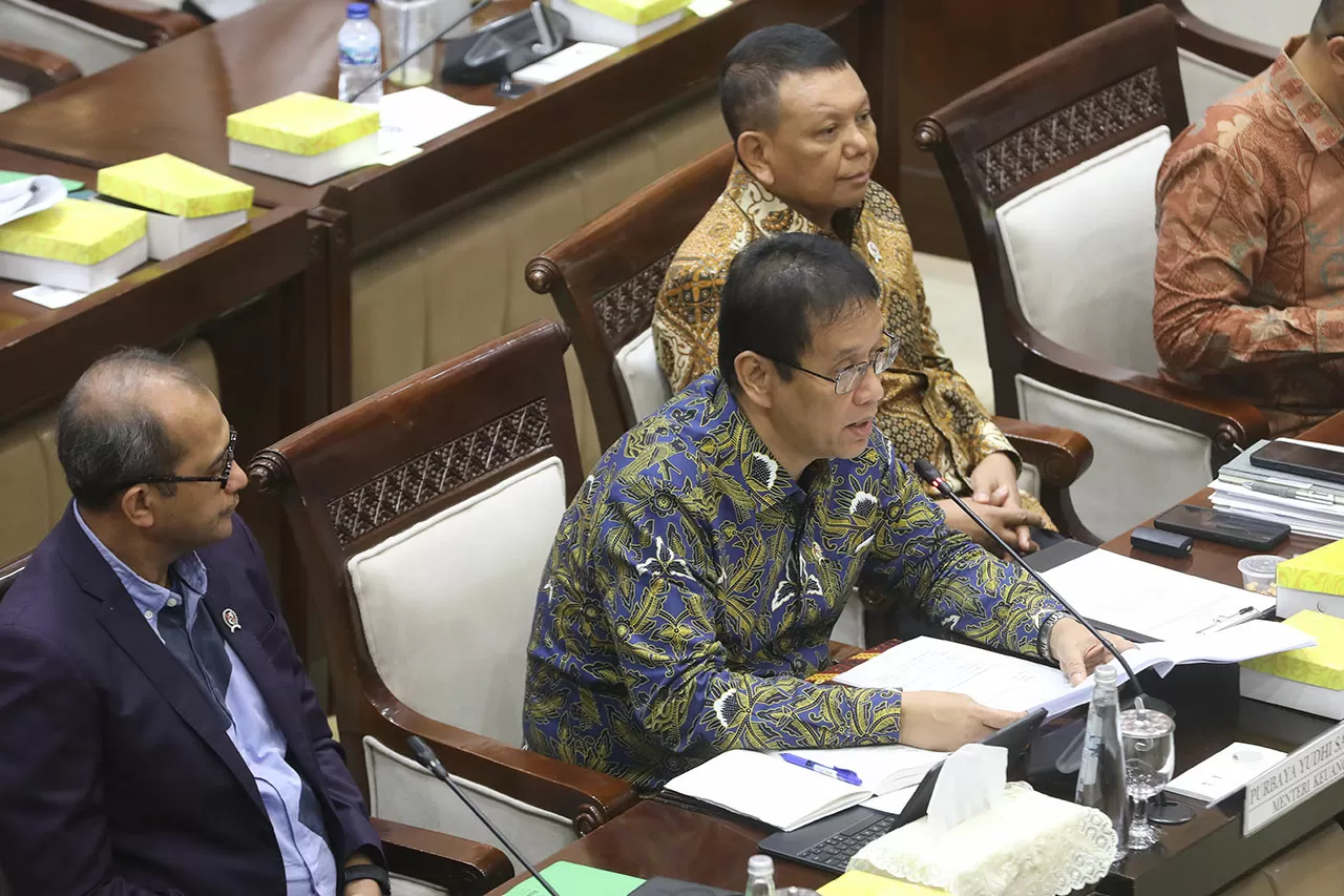 Komisi XI DPR dan Pemerintah...