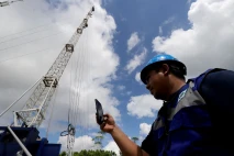 XL Axiata Membangun...