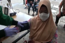 Vaksinasi Booster di...