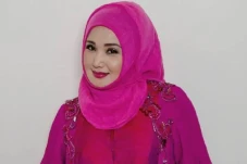 Profil Evie Tamala,...