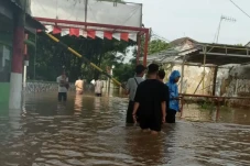 Diguyur Hujan Deras,...
