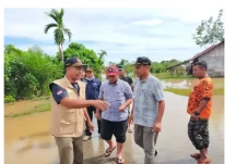 Banjir yang Melanda...