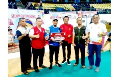 Ketua KONI Pelalawan...