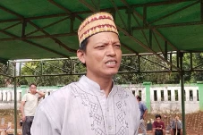 Mendiang Ogud Tom Tam...