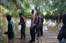 Berenang di Sungai Megang,...